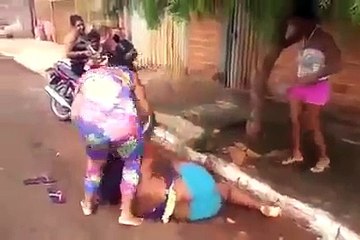 Girls Engaged in a Physical Dispute on the Road