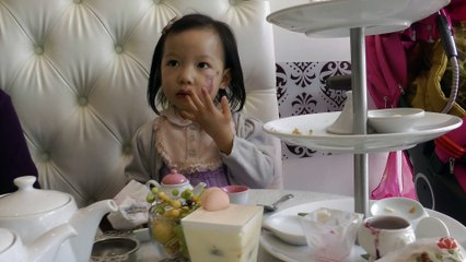 Girl Having Afternoon Tea*