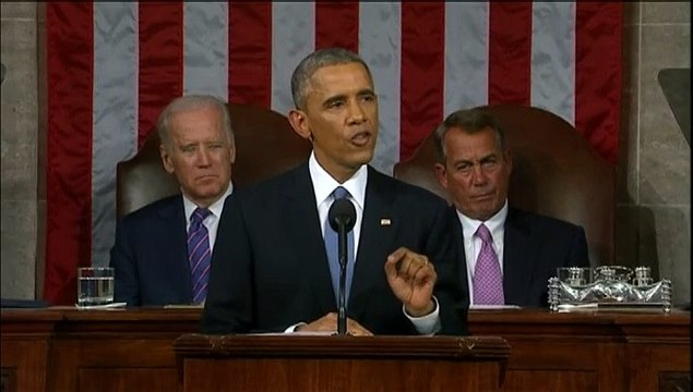 Des élus américains brandissent des crayons lors du discours de Barack Obama