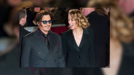 Johnny Depp y Amber Heard posan de la mano en el lanzamiento de Mordecai