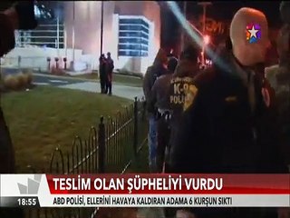 Amerikan polisi ellerini kaldırıp teslim olan şüpheliyi böyle vurdu