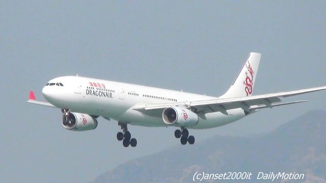 Dragonair Planes Landing in Hong Kong Airport. Airbus A320 and A330