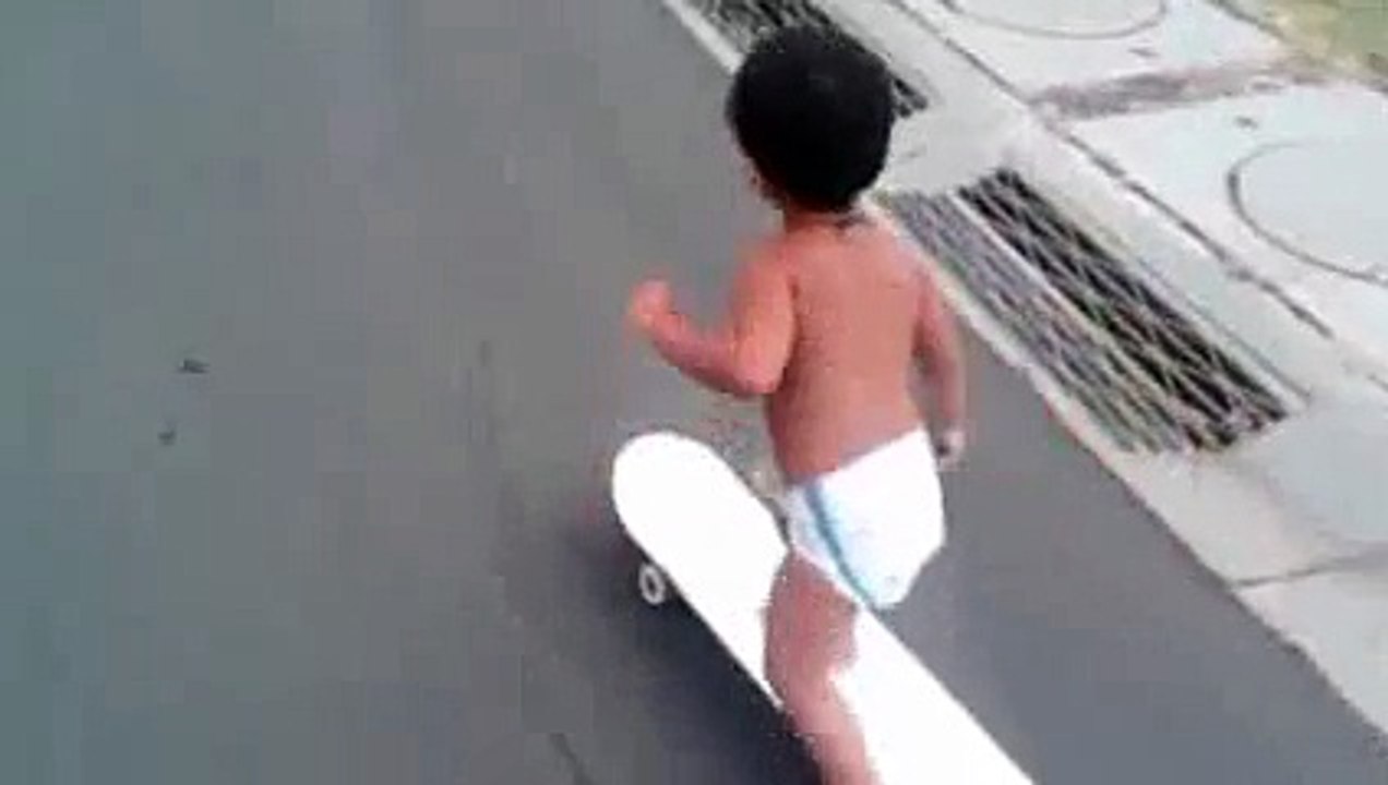 Skateboarding toddler