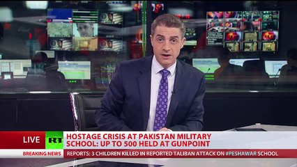 Taliban takes hundreds of students hostage in Pakistan school, scores killed