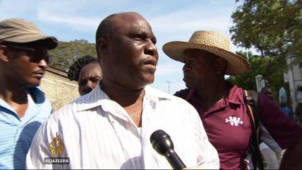 Haitians protest against president and UN