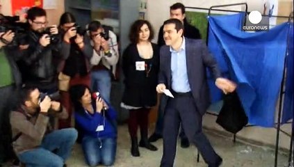 Greece election: Tsipras promises 'return to democracy'