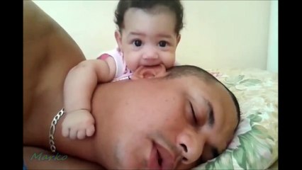 Baby Girl Chewing Daddy's Ear