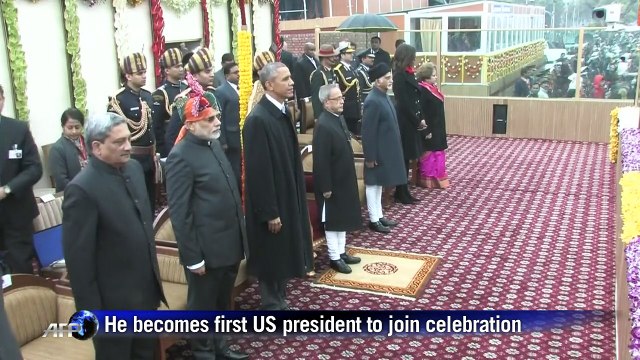 Rain fails to dampen cheer as Obama attends India parade