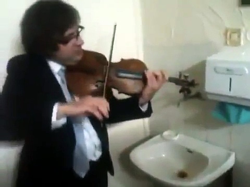 Awesome Violin Performance In Toilet