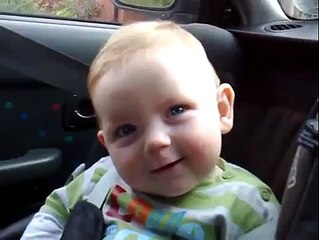 Cute baby fighting sleep in the Car