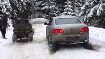 VW Phaeton 5.0 V10 TDI vs. ATV 750cc Snow Drag