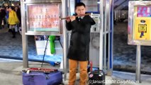 Hong Kong Street Musician Plays the Chinese Flute. Traditional Instrument