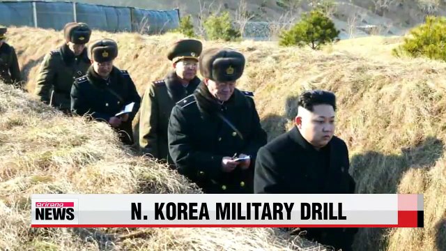 N. Korean leader oversees military drill, slams Obama for comments about regime