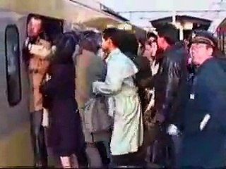 The peoples are pushed in metro train in china due to rush very funny