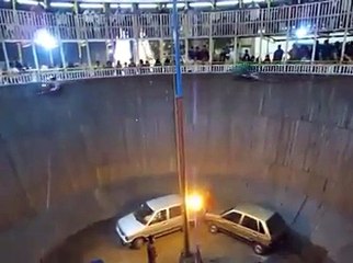 Gravity-defying stuntmen stun audience in the Well of Death