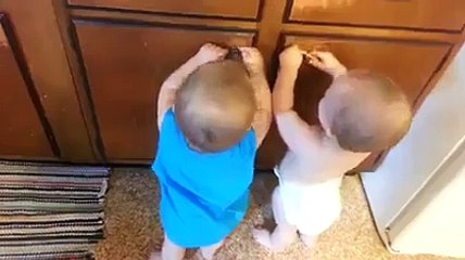 Cute Little Babies playing with rubber band very funny