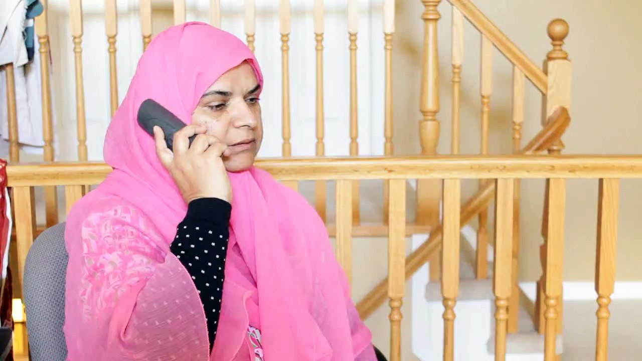 Brown parents on the phone..