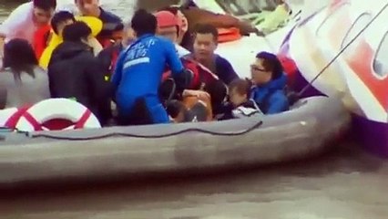 Taiwan TransAsia flight GE235 crash- Amazing video shows toddler rescued alive from aircraft wreckage