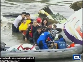 Taiwan pilot hailed as a hero as wreckage scoured