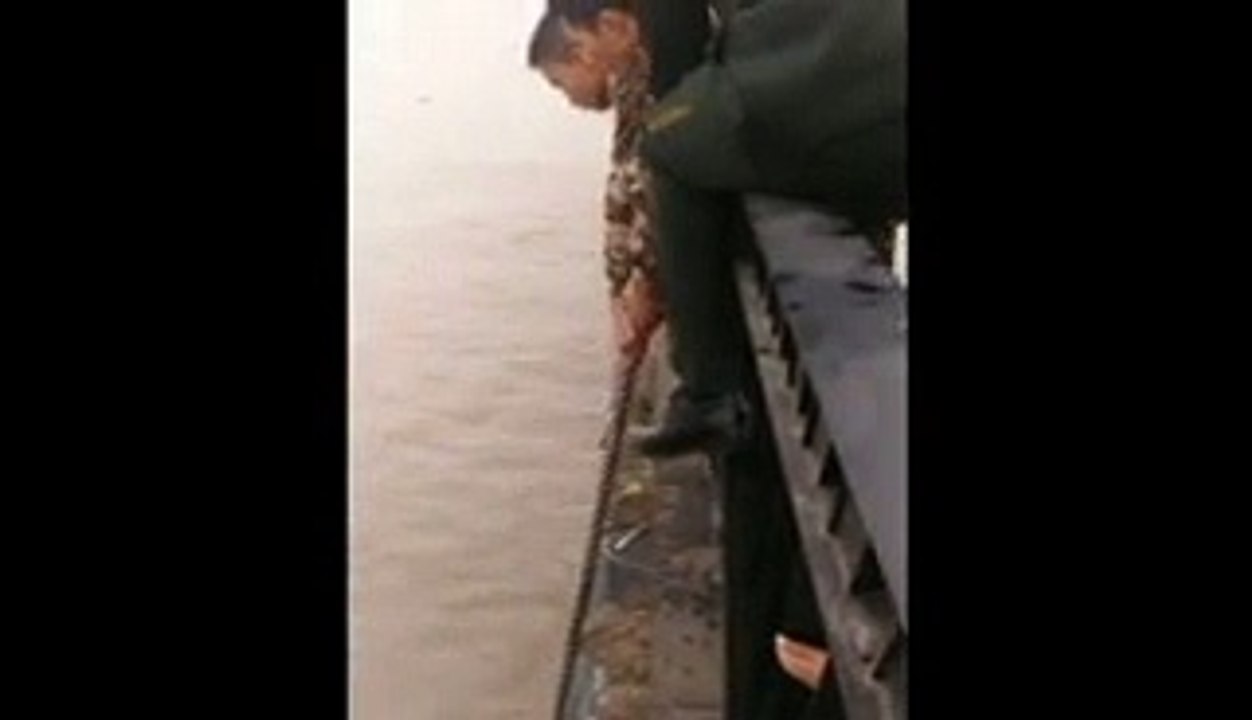 Soldiers rescue woman who jumped into river