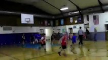 8 year old kid hits a 3/4 court buzzer beater! Amazing