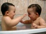 Twins Brothers Enjoying Bath Time