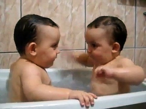 Twins Brothers Enjoying Bath Time