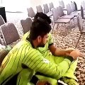 Can you tell what Ahmed Shahzad and Umer Akmal doing watch video
