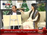 Abid Ali showing off his amazing paintings & also sketching off his wife in live show