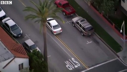 Police chase gunman in car across LA