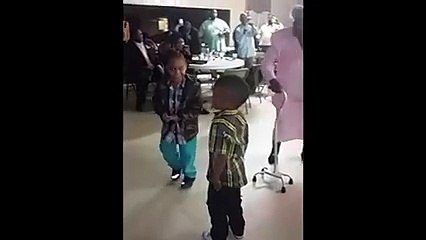 Grandma showing moves to little kids to funny