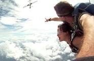 Two skydivers nearly hit by a plane