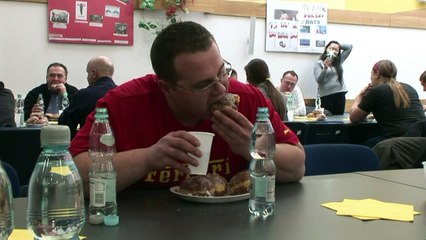 Doughnut eating contest on 'Shrove Thursday' in Poland