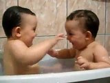 Twins Brothers Enjoying Bath Time -