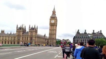 Magician Dynamo levitates on side of London bus