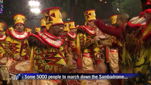 Rain fails to dampen Rio carnival atmosphere