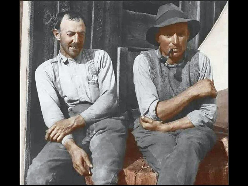 Colorisation of a photograph of two farmers (c 1930)