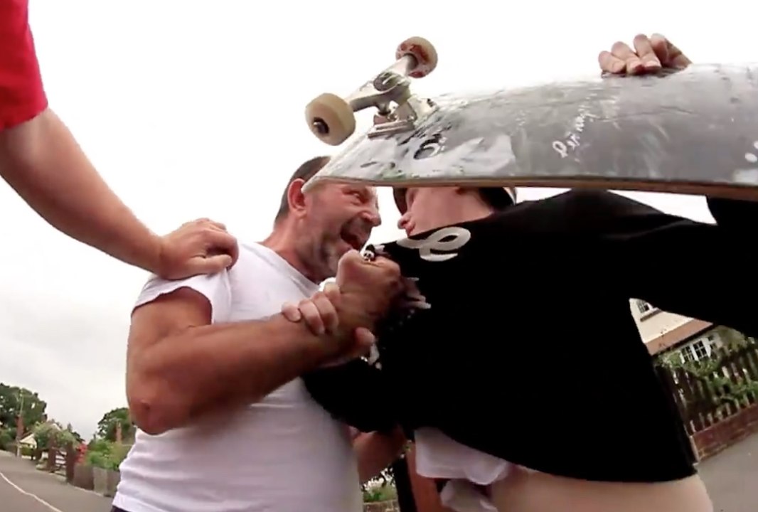 Angry man is fighting again skaters