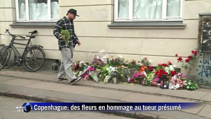 Copenhague: bouquets et bougies en hommage au tueur présumé
