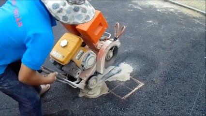 Khoan cắt bê tông dựng cột lưới sân tennis