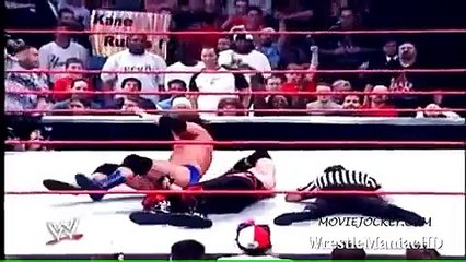 Kane showing his burnt face in WWE by revealing his mask........!