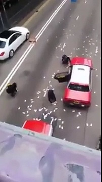 Extremely Hilarious Funny Clips: 15 million dollars have been dropped on highway in hongkong