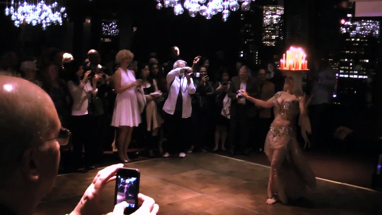 Neon belly dance   candle tray dance at 230 Fifth Ave. Empire Room, New York City
