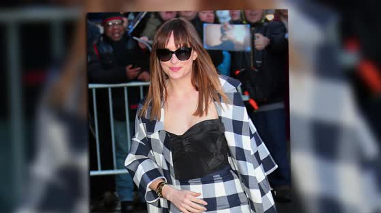 Dakota Johnson Continues Fifty Shades Of Grey Promotion After Breaking Box Office Records