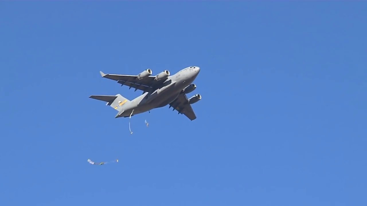 C-17 Globemaster, A-10, C-130 And US Paratroopers in Military Excercise