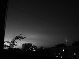 Time lapse of noctilucent clouds and Iridium flare in Moscow, 19 July 2009