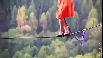 can you beleive this rope walking with high heel.