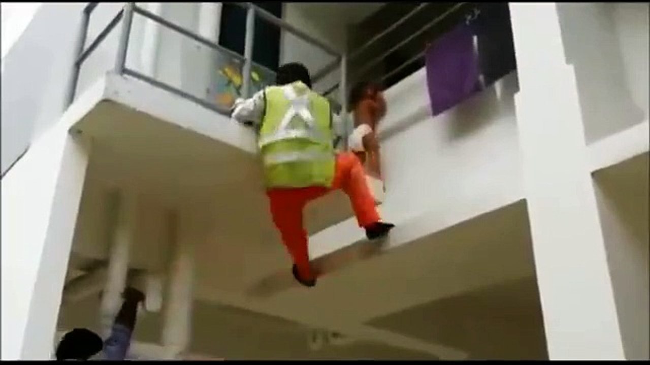 Man Rescuing Small Child