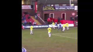 Worcester City’s Shab Khan performed a WWE body slam on a Stockport player 2015