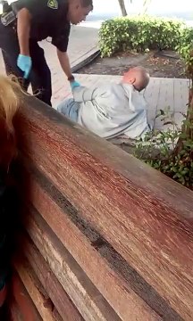 Cop Brutally Slaps Homeless Man at Bus Station